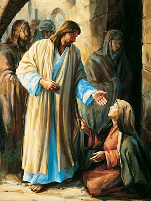 touching the hem of the garment of Jesus